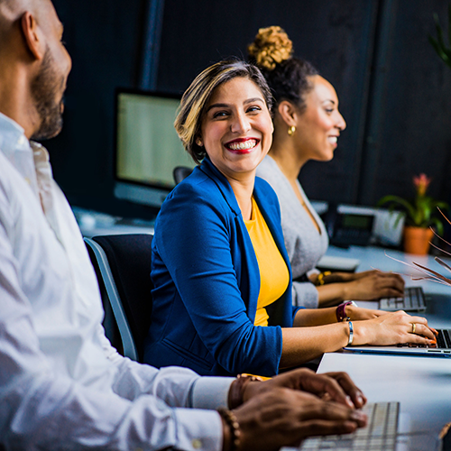 Woman smiling at coworker